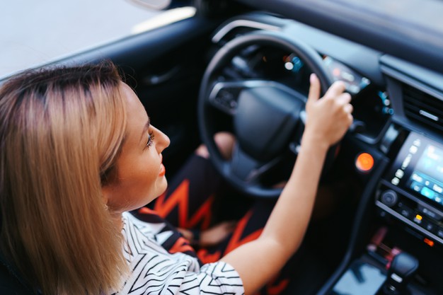 confident beautiful woman car usa