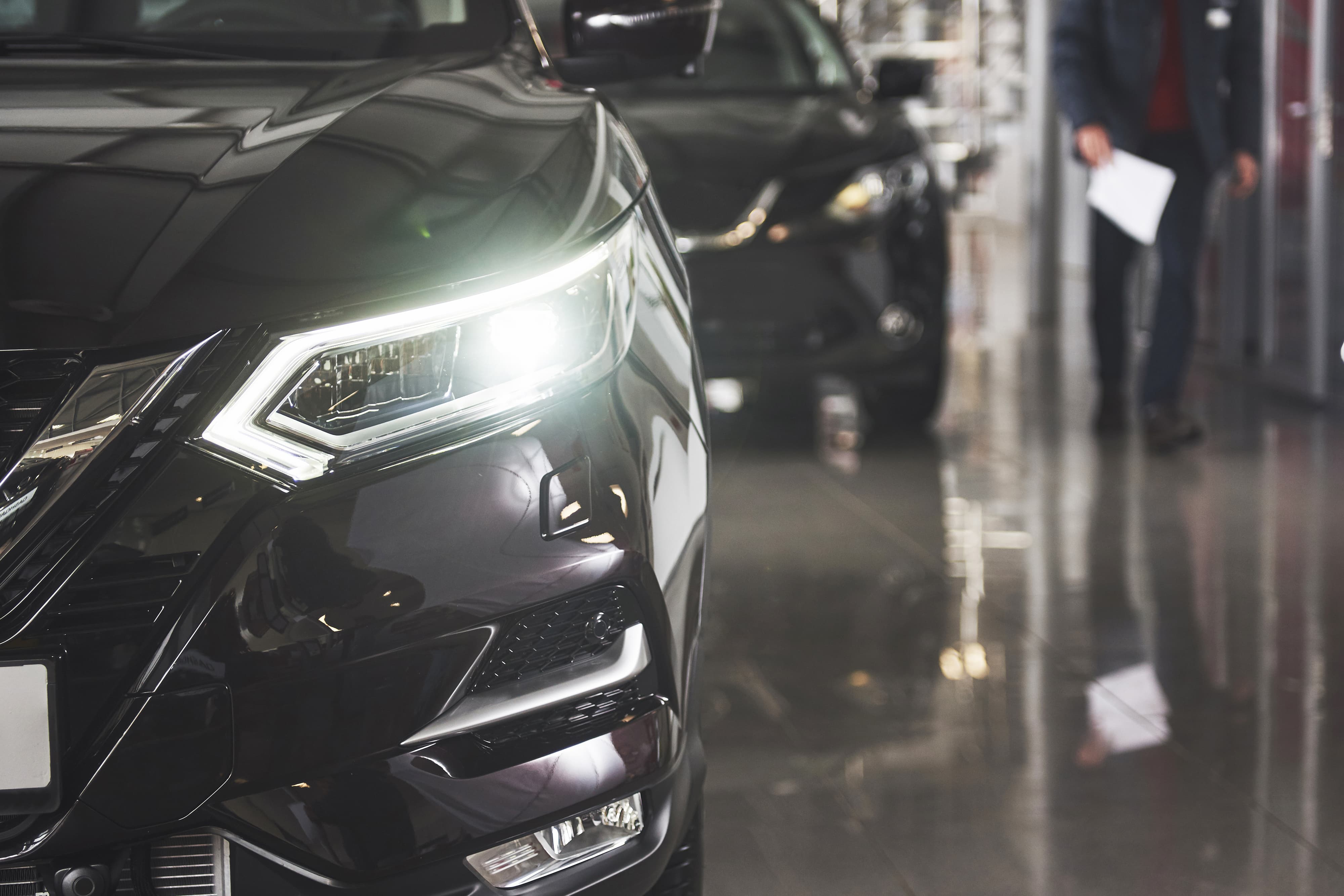 headlights-hood-black-luxury-car.jpeg
